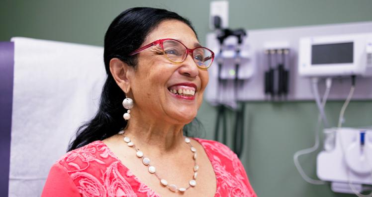 Elderly Woman Smiling While Wearing Glasses