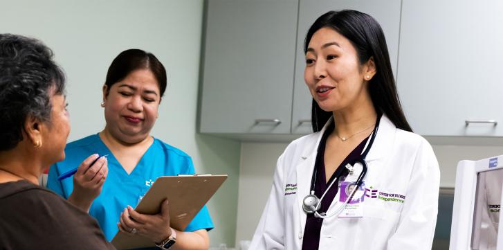 Elder Woman with Doctor in Revision