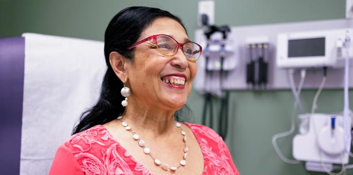Elderly Woman Smiling While Wearing Glasses