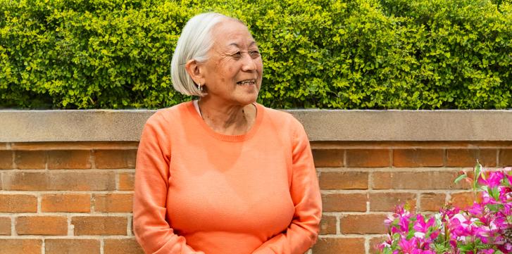 Elderly Woman In Garden