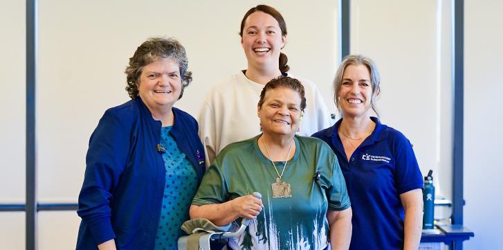 Portrait of two PACE members and two PACE staff 