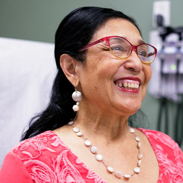 Elderly Woman Wearing Glasses and Smilling