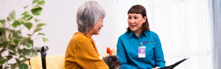 Caregiver Talking with a Patient