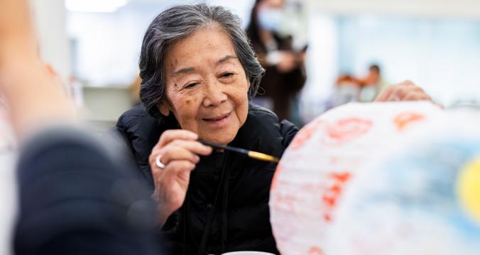 Elderly Woman Painting Decoration