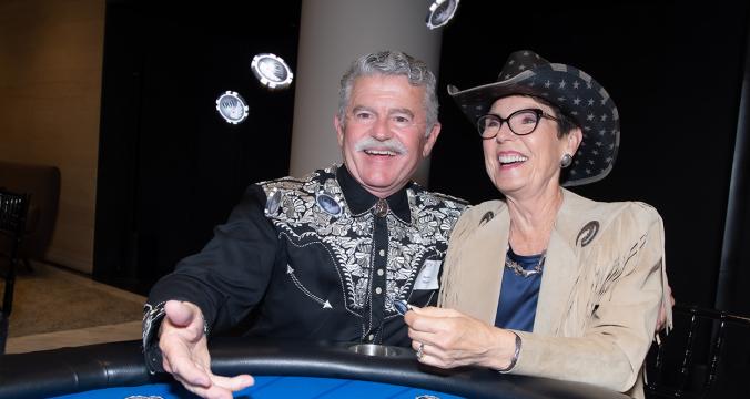 Woman and Men Playing on Casino